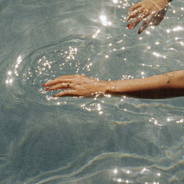 Hands in water
